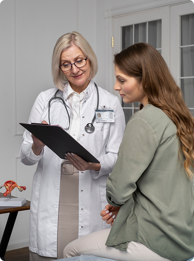 Female GP reviewing a clipboard with a young woman during a consultation at Botanic Ridge Doctors